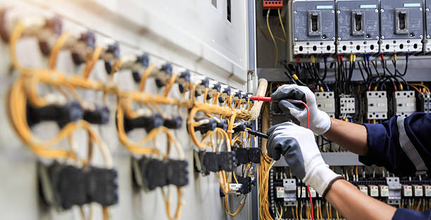 Professional Electrician technician working in Blossom, TX